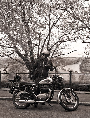 Nigel Buckie, founder and director of object Architecture, and his BSA motorbike at Richmond Park, London 